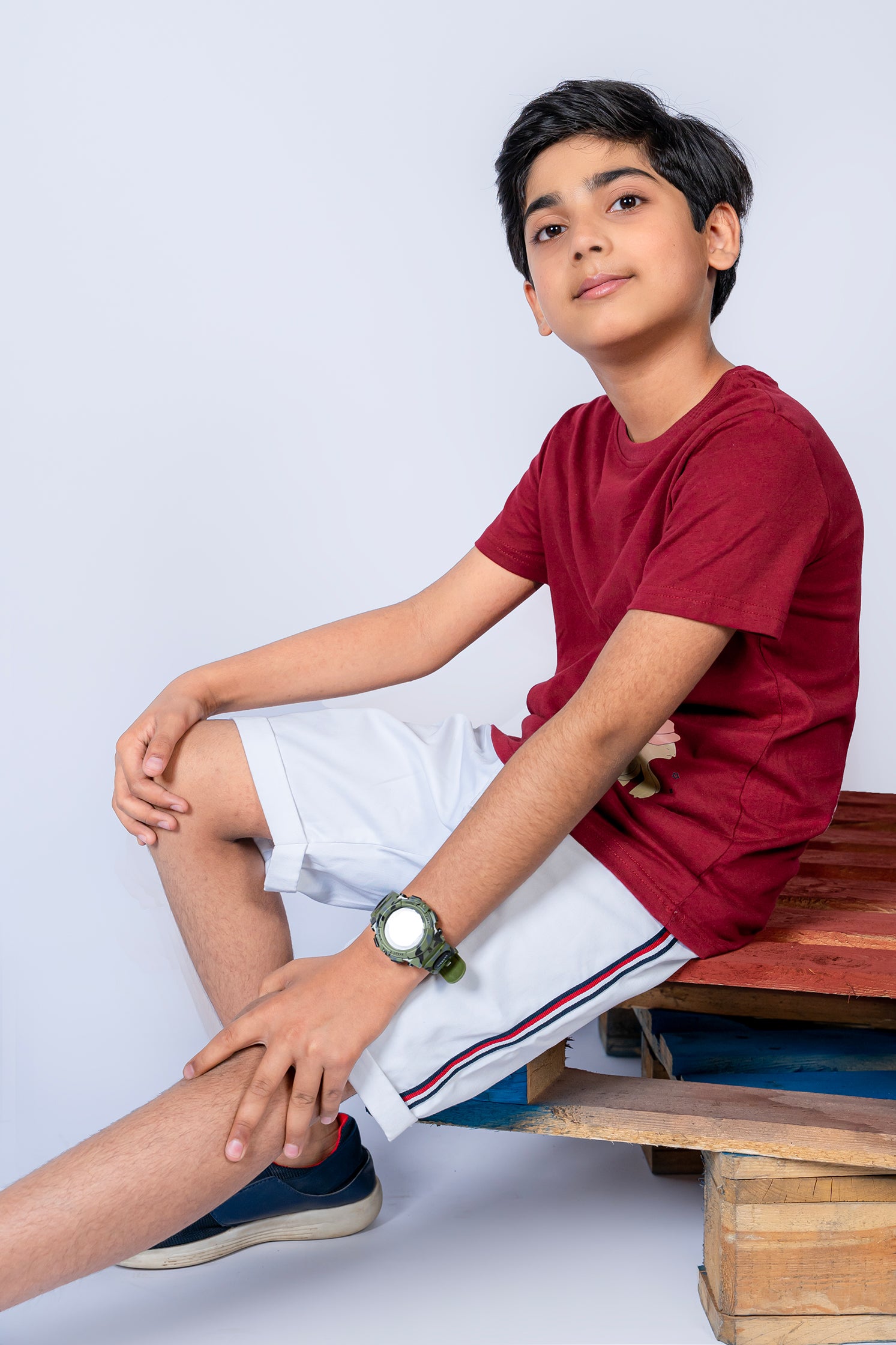 BOY'S T-SHIRT MAROON WITH "STILL PROGRESS" PRINTING