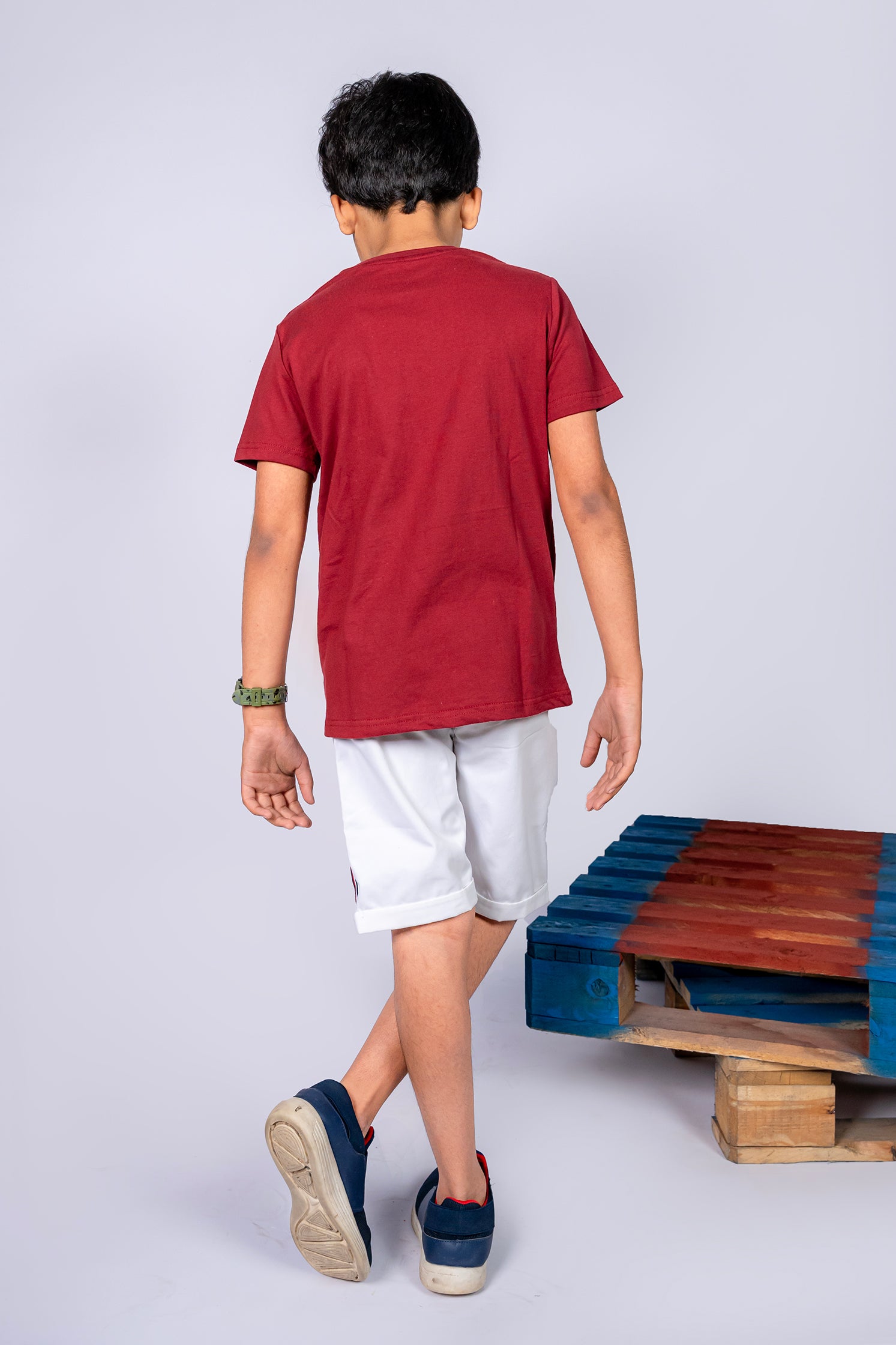 BOY'S T-SHIRT MAROON WITH "STILL PROGRESS" PRINTING