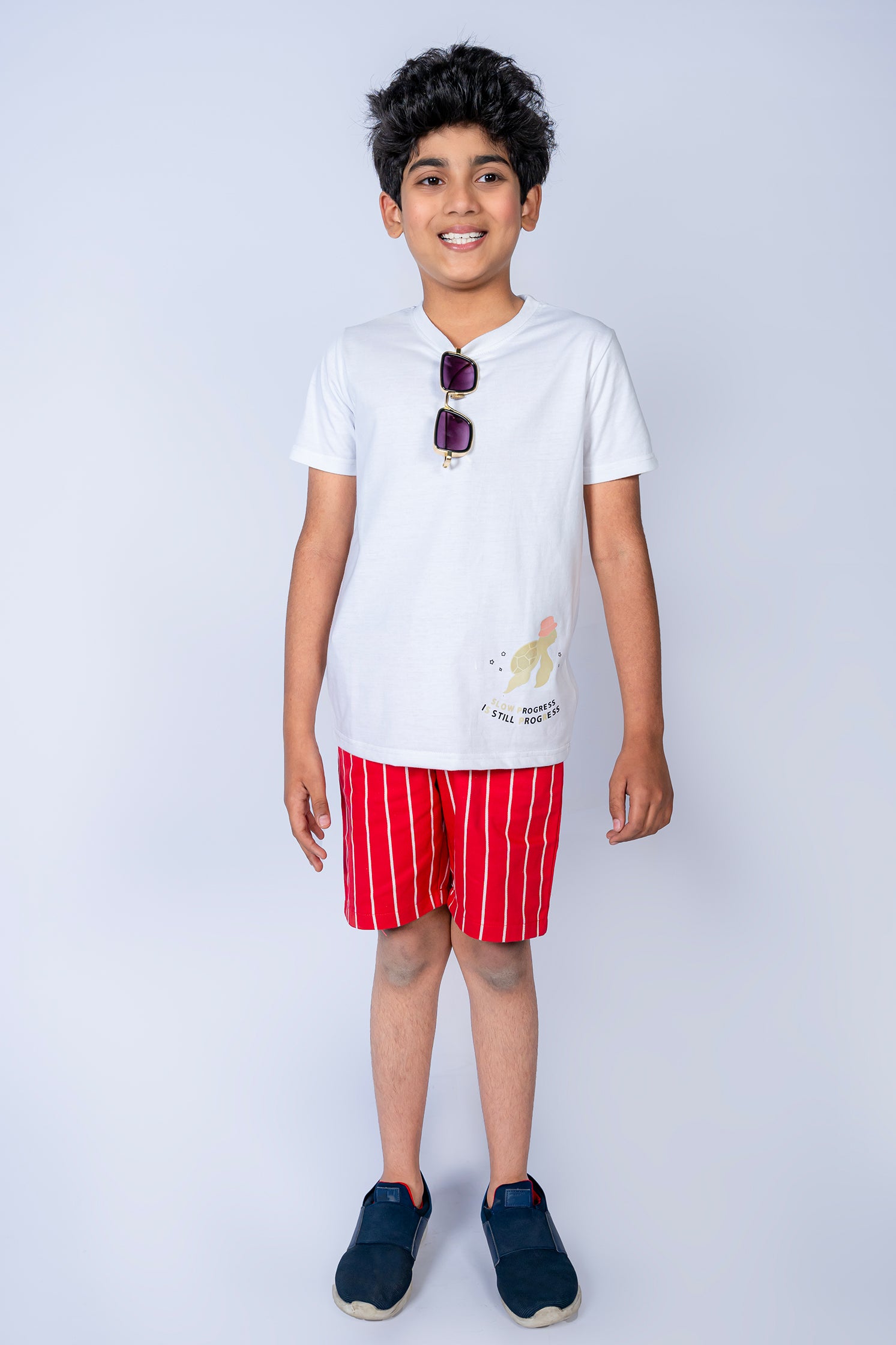 BOY'S T-SHIRT WHITE WITH "STILL PROGRESS" PRINTING