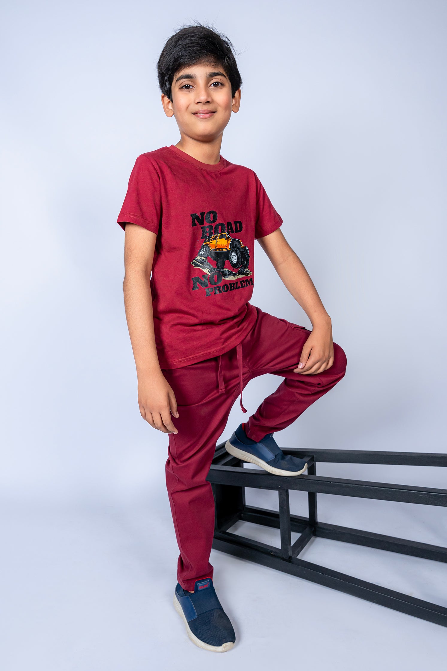 BOY'S T-SHIRT MAROON WITH FRONT "NO ROAD NO CAR" PRINTING