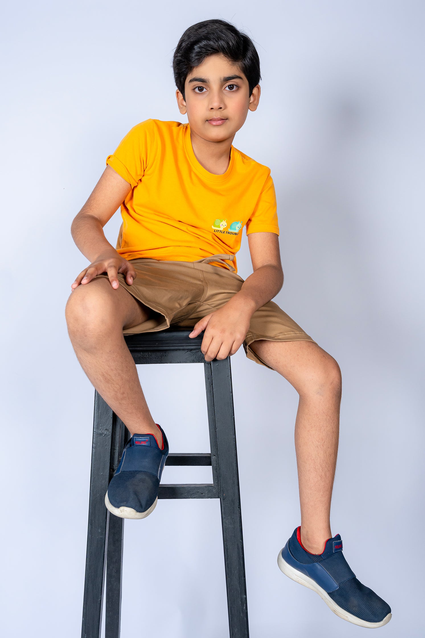 BOY'S T-SHIRT MUSTARD WITH "LITTLE TROUBLE" PRINTING