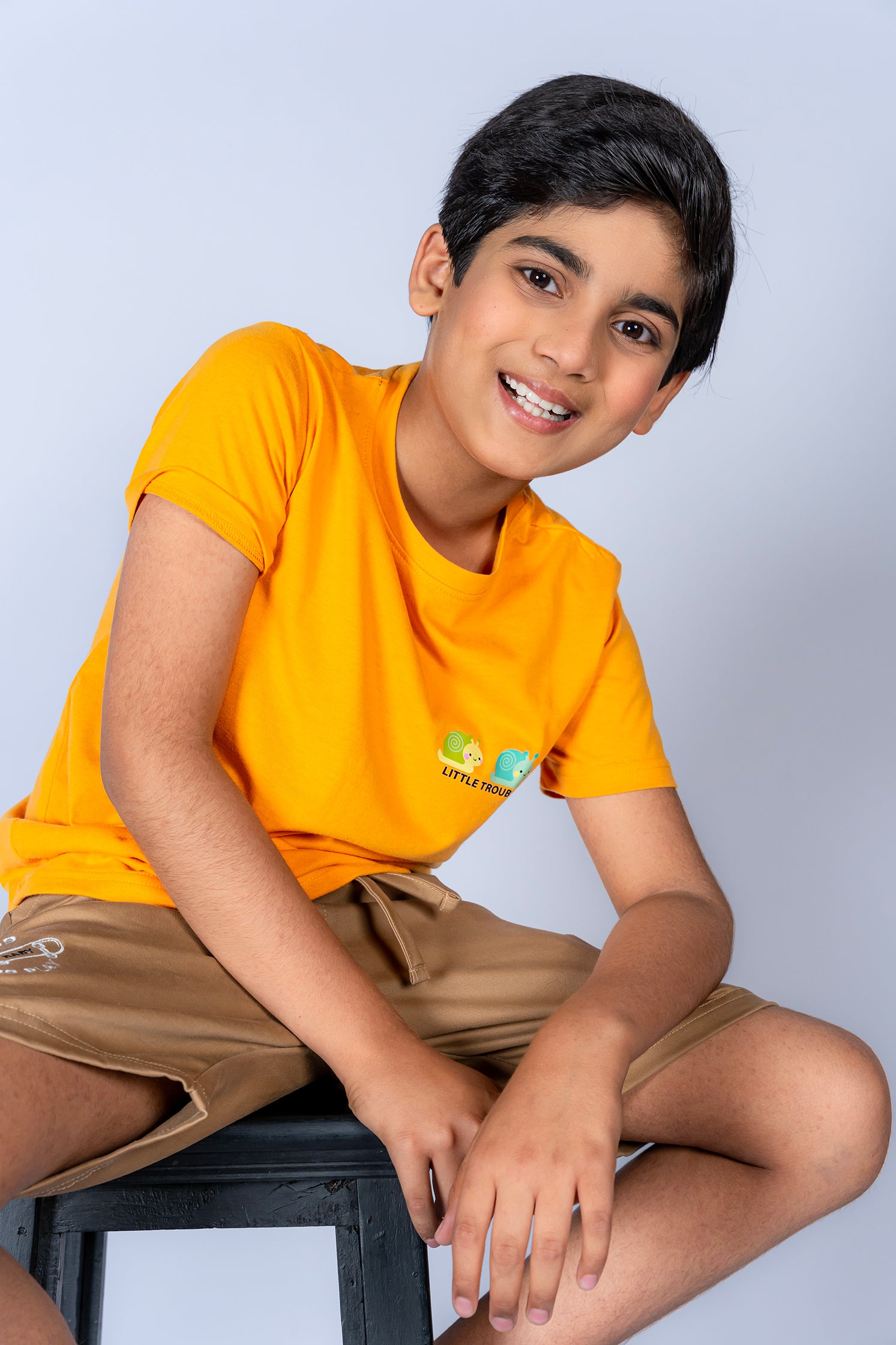BOY'S T-SHIRT MUSTARD WITH "LITTLE TROUBLE" PRINTING