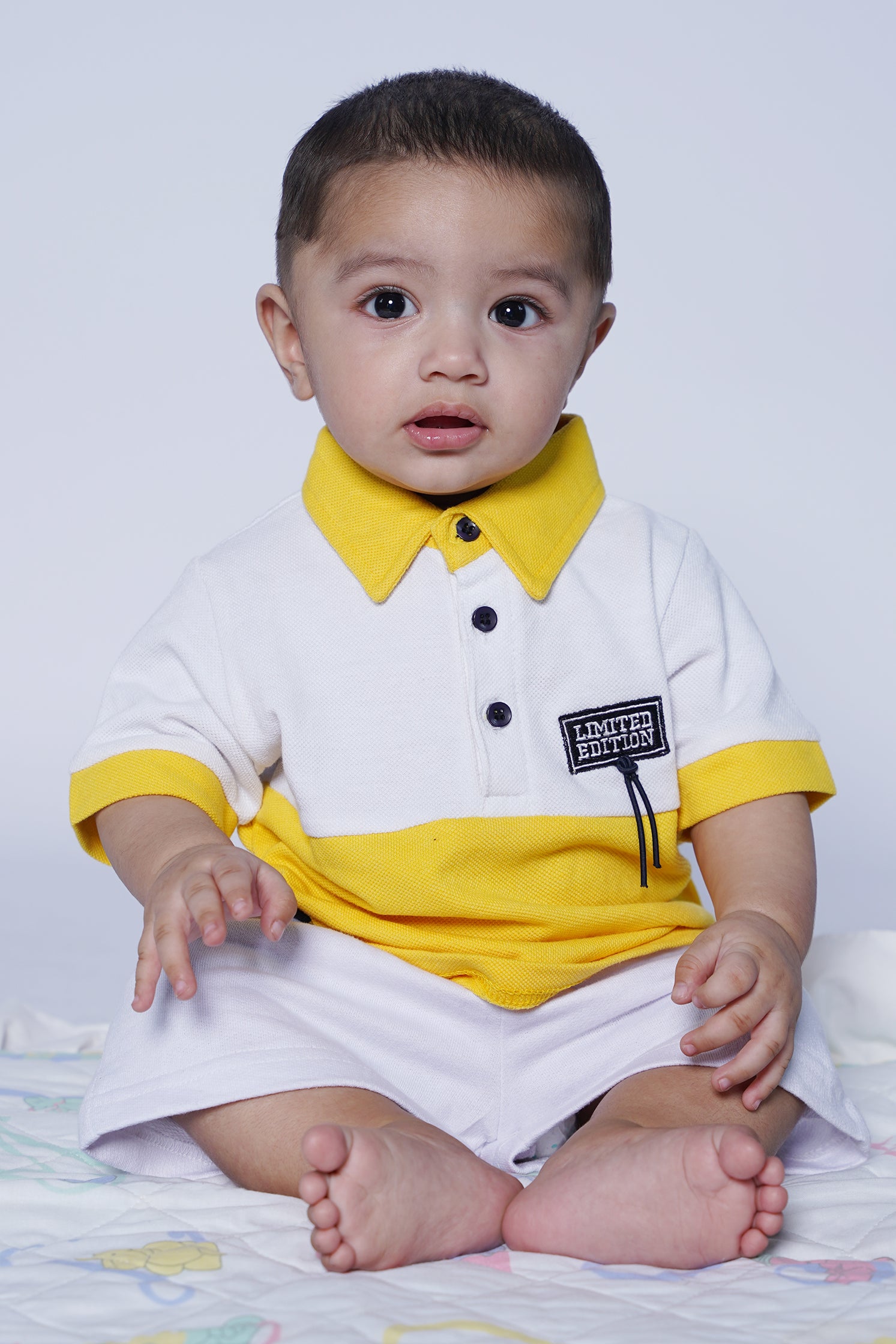 UNISEX BABY POLO WHITE AND YELLOW
