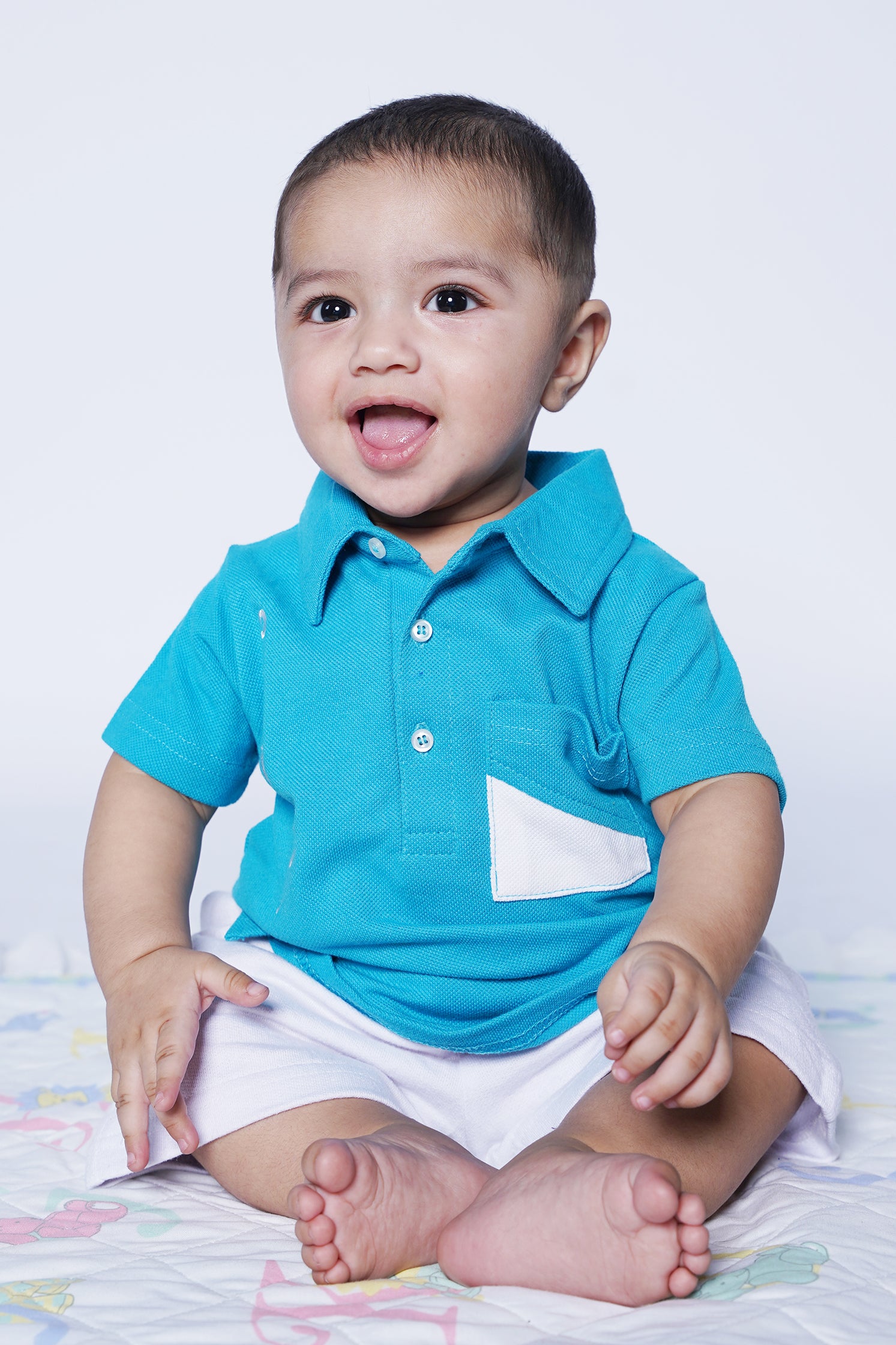 UNISEX BABY POLO BLUE WITH "PRO KIDS" EMBROIDERY