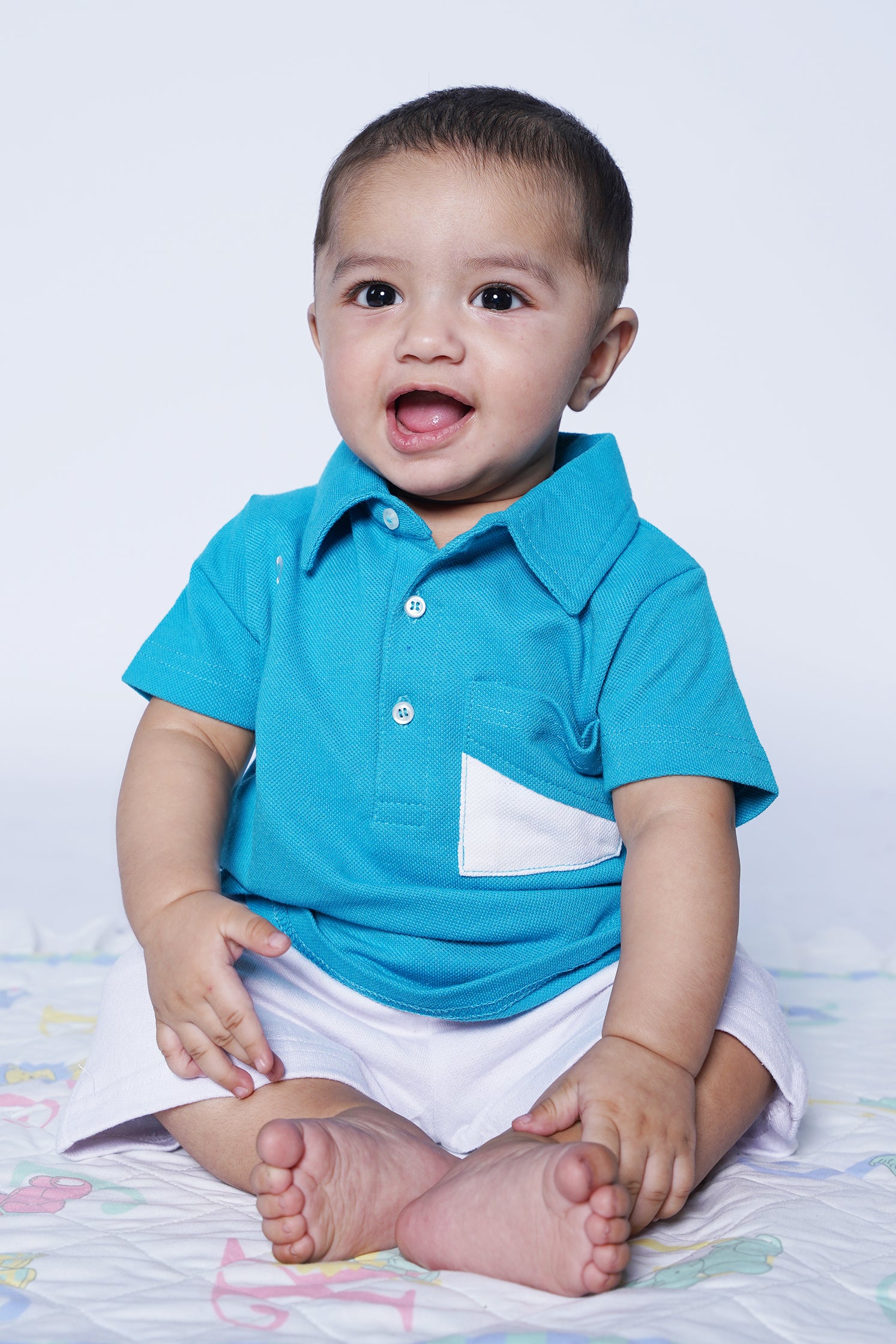 UNISEX BABY POLO BLUE WITH "PRO KIDS" EMBROIDERY