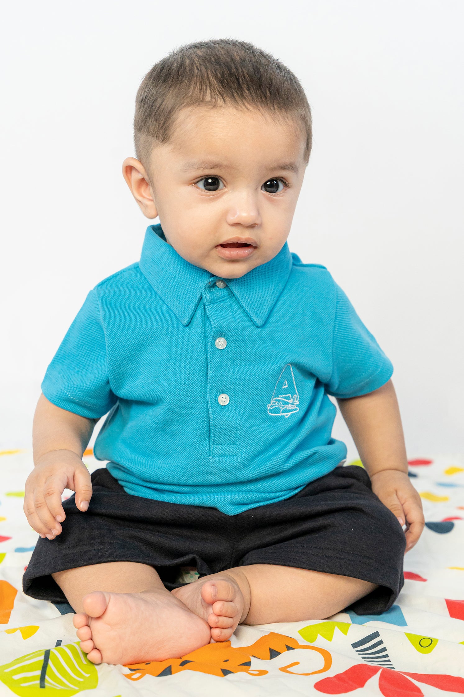 UNISEX BABY POLO BLUE WITH "A" EMBROIDERY