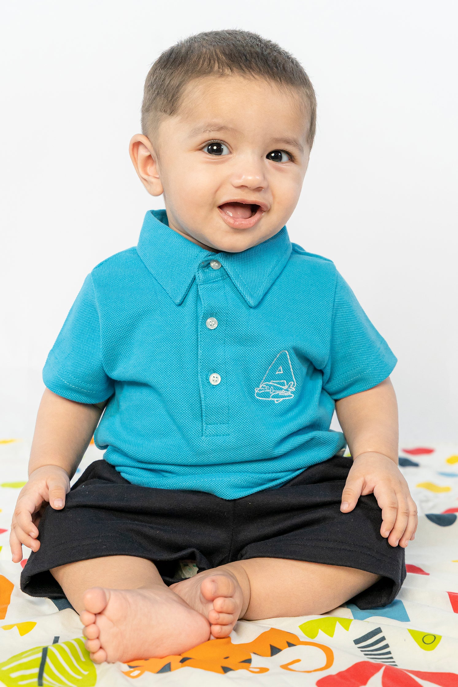 UNISEX BABY POLO BLUE WITH "A" EMBROIDERY