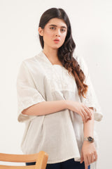 Ladies Lawn light grey loose fitted top enriched with the delicate floral embroidery